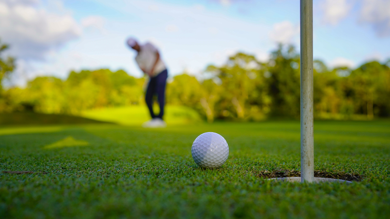 a golfer playing golf