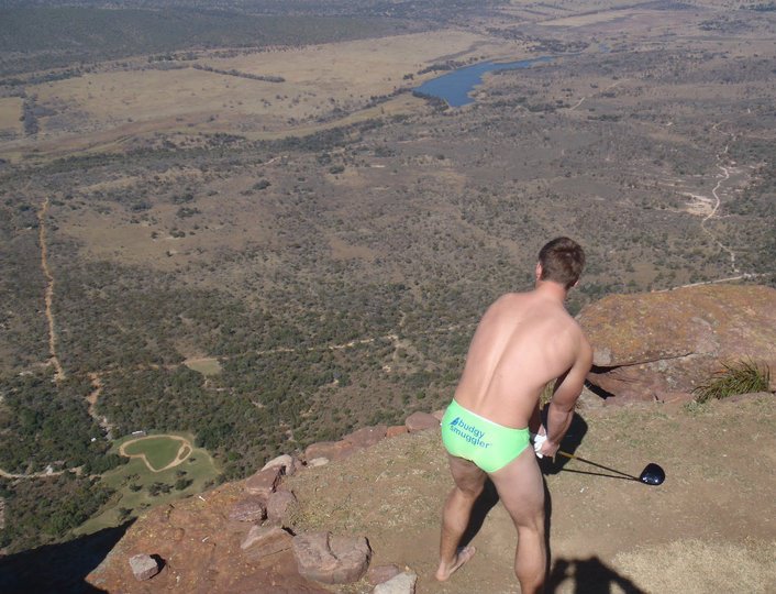 A golfer at the tee of the Extreme Hole 19 in Legend Golf & Safari Resort