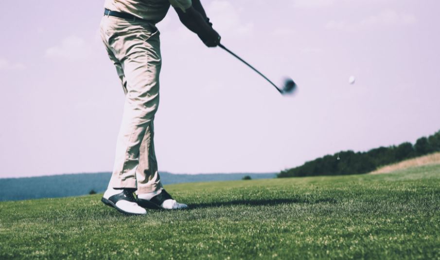 Player hitting a golf ball