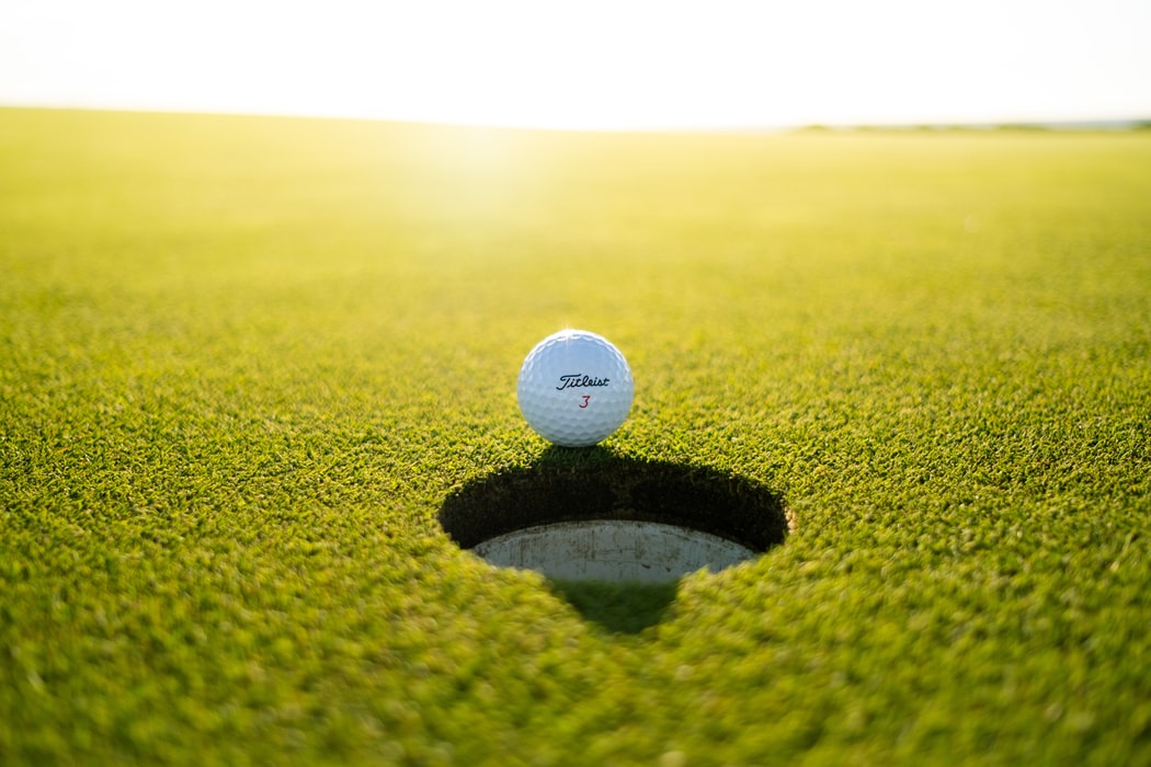 golf ball near the hole