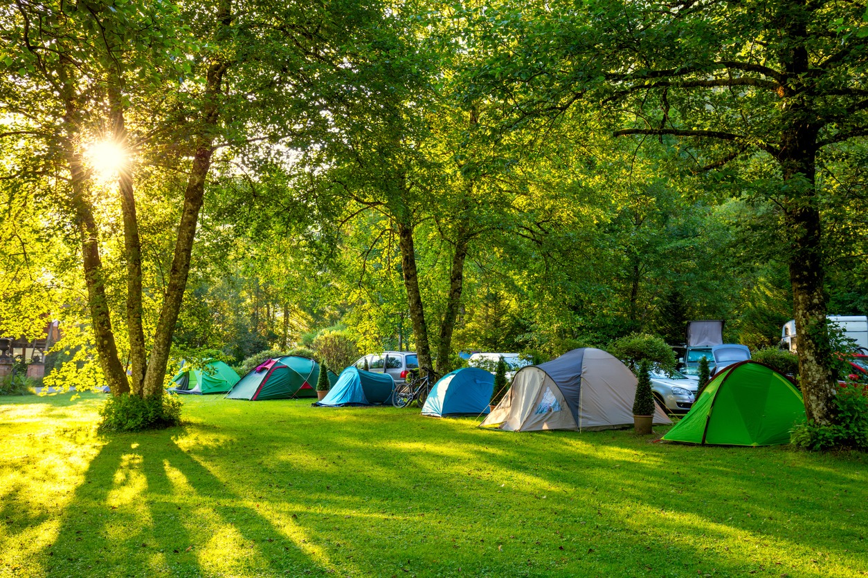 a row of tents set up beside a course
