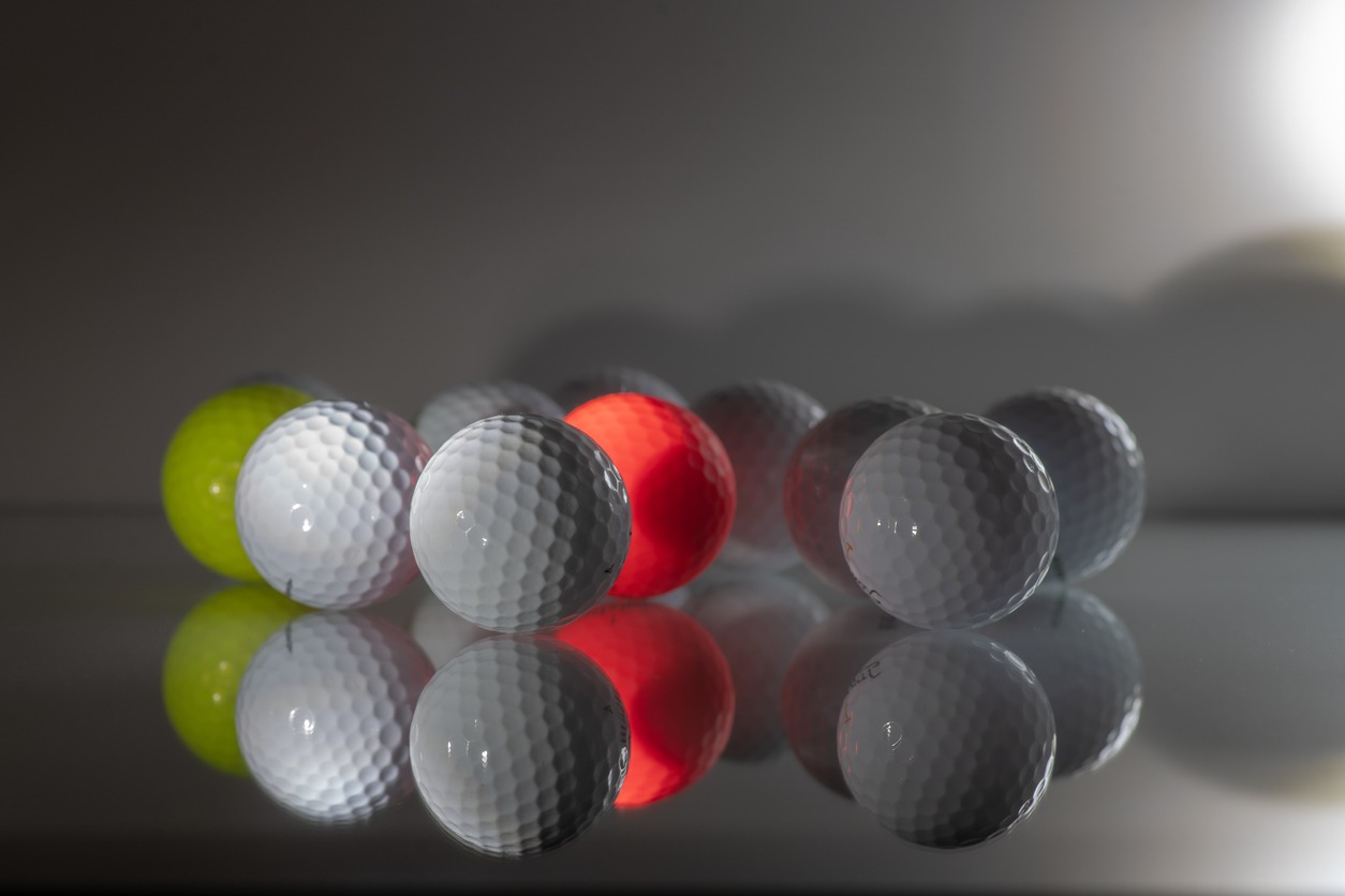 a set of reflective golf balls